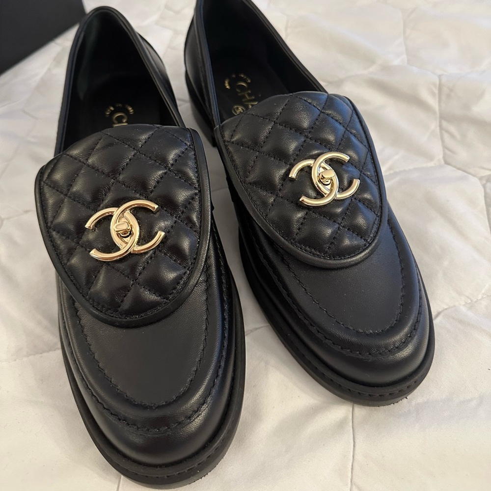 Chanel turn lock loafers, size 40.5. Comes with box, dust bag, worn one time.